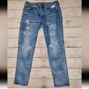 American Eagle medium blue wash distressed ripped tom girl Jean's